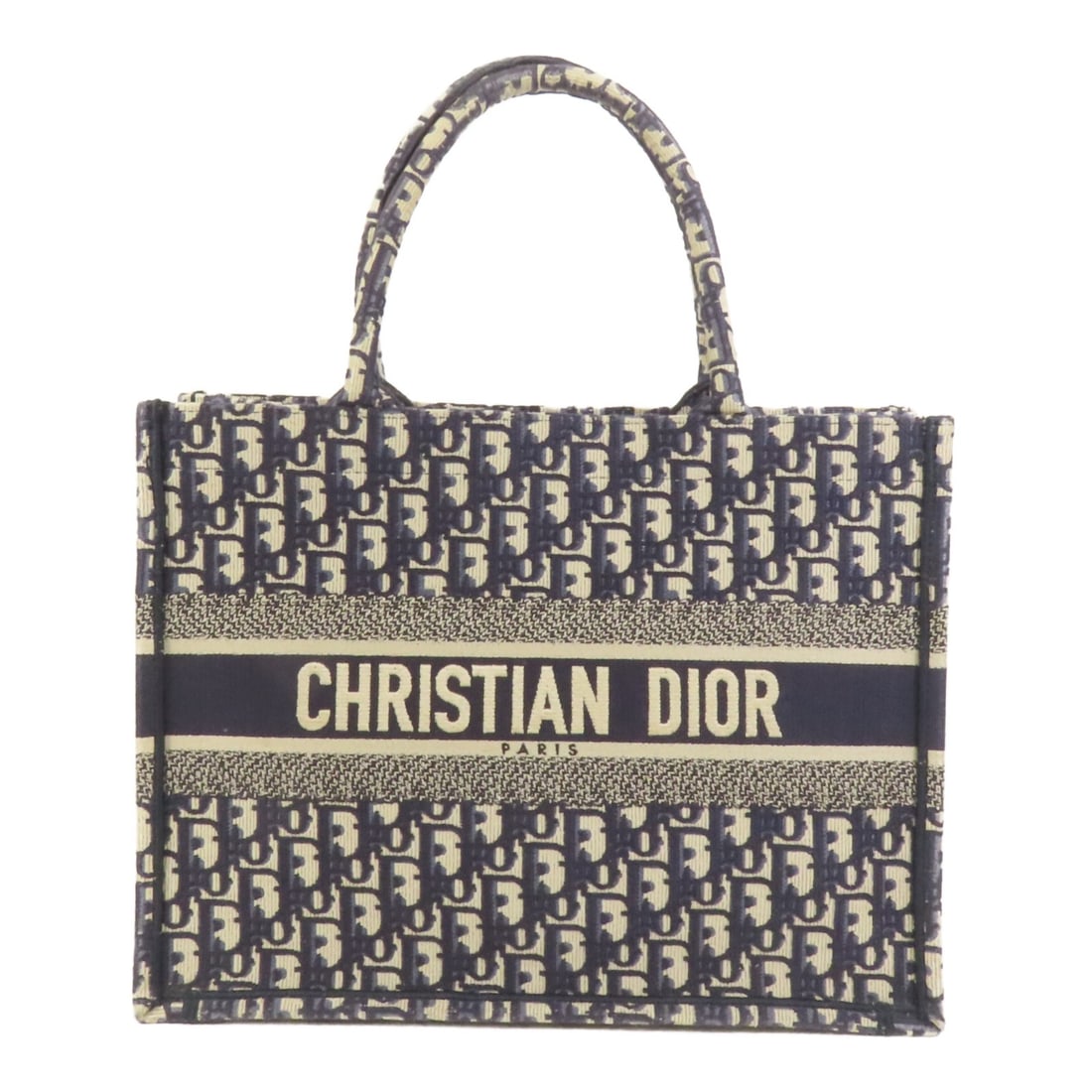 Dior Book Tote Medium Blue Canvas Handbag from France: Dior Book Tote Medium Blue Canvas Handbag from France This Christian Dior Book Tote Medium Handbag is crafted from blue canvas and features a structured silhouette. Made in France, it offers a spaciou