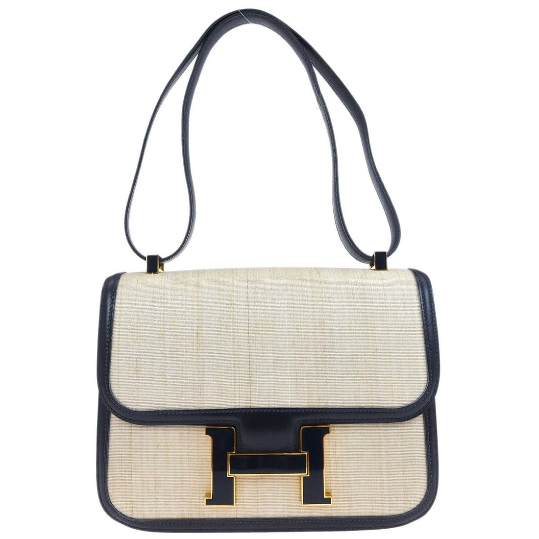 Hermes Constance 23 Box Calf Leather Shoulder Bag Natural and Navy: Hermes Constance 23 Box Calf Leather Shoulder Bag Natural and Navy This Hermes Constance 23 shoulder bag features a natural exterior color crafted from box calf leather. The bag offers a versatile sho