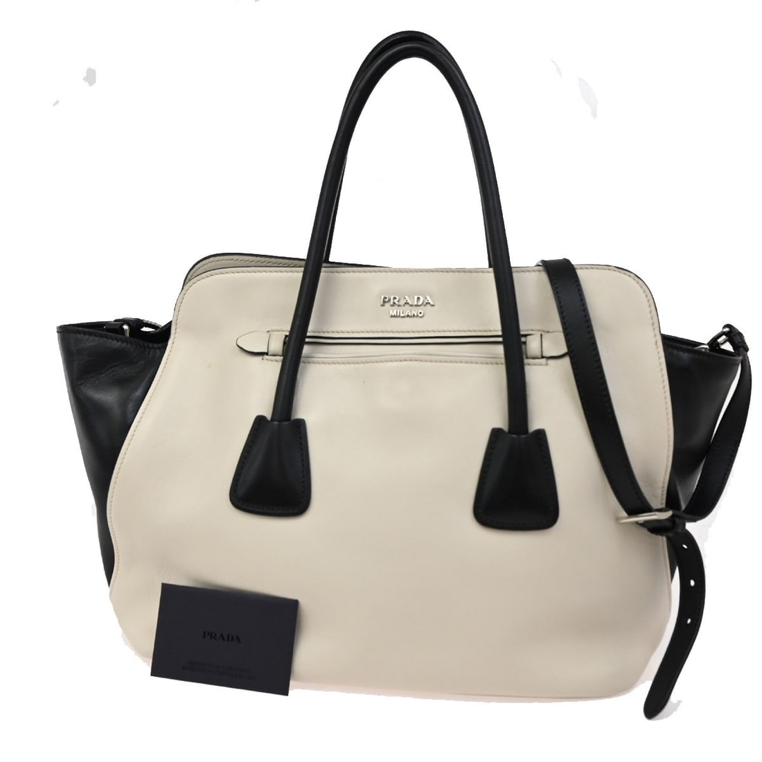 Prada Beige Leather Cuir Convertible Tote Bag: Prada Beige Leather Cuir Convertible Tote Bag This Prada Cuir Convertible Shopping Tote is crafted from soft beige leather and designed for women. The bag features a spacious interior, making it funct