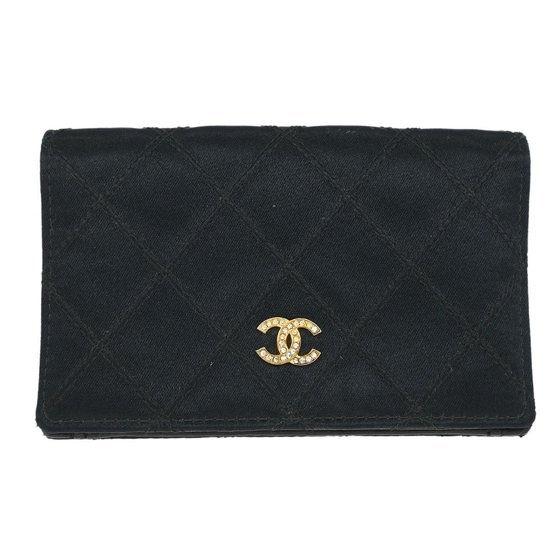 Black Satin Bicolore Folding Coin Wallet by Chanel: Black Satin Bicolore Folding Coin Wallet by Chanel This vintage Chanel coin purse wallet features a black satin leather exterior with the iconic CC pattern. Designed with a folding style, it combines