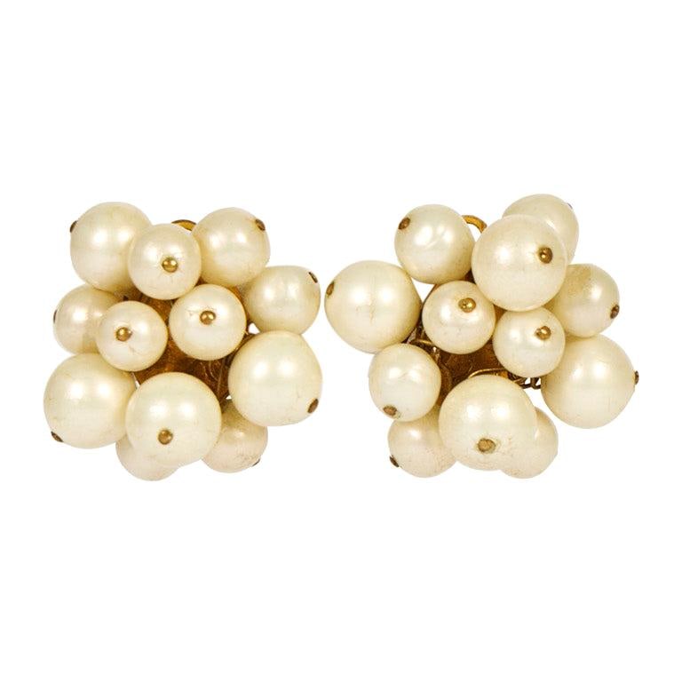 1970s Chanel Pearl Cluster Clip Earrings France Vintage: 1970s Chanel Pearl Cluster Clip Earrings France Vintage These exquisite vintage Chanel pearl cluster clip earrings from the 1970s showcase a unique design featuring a cluster of lustrous pearls, makin