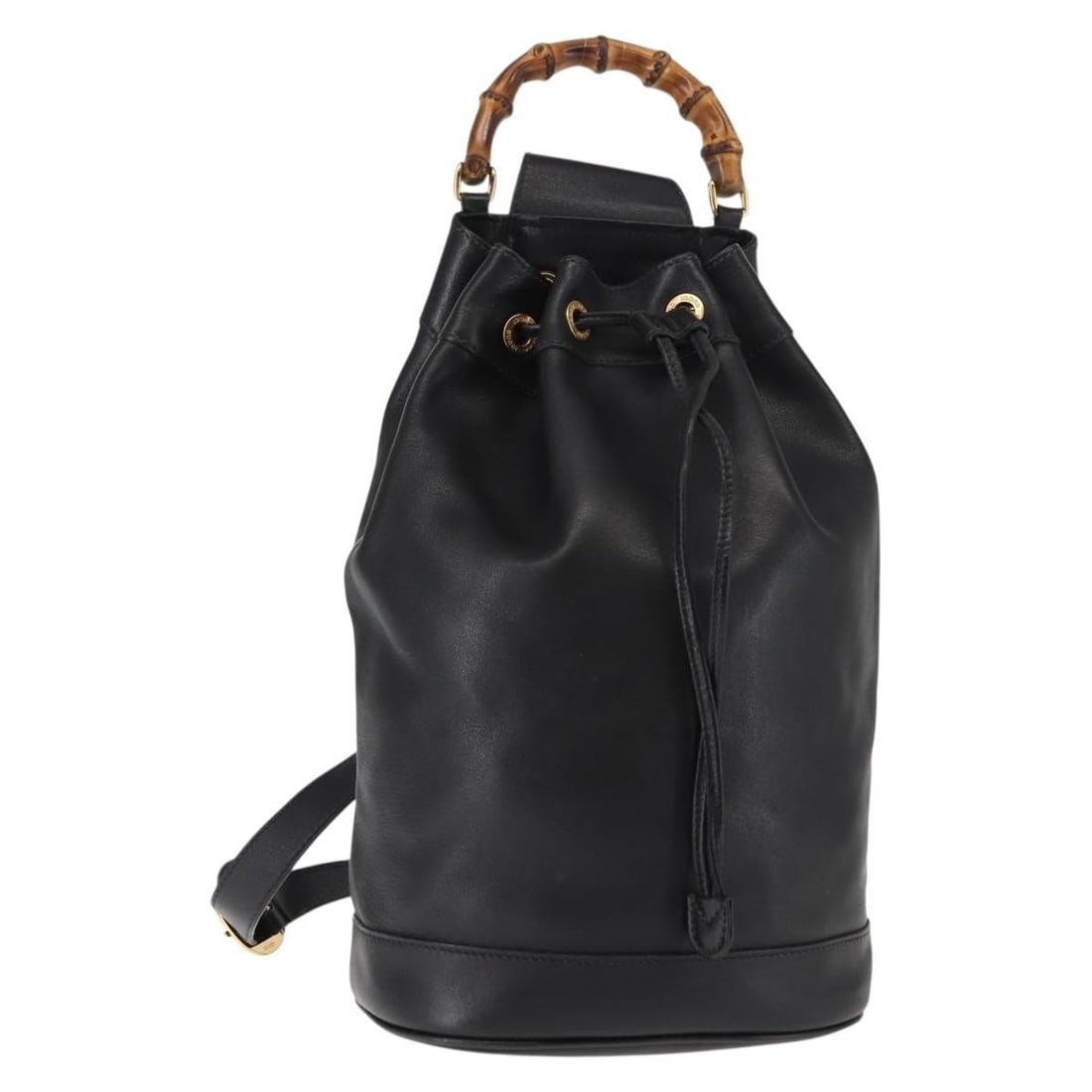 Gucci Black Leather Vintage Bamboo Sling Backpack Purse: Gucci Black Leather Vintage Bamboo Sling Backpack Purse This Gucci Vintage Bamboo Sling Backpack is crafted from black leather and features signature bamboo details. Designed for women, it offers a st