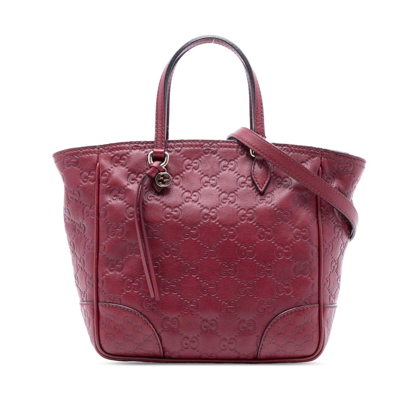 Gucci Small Guccissima Bree Satchel Red Leather Bag: Gucci Small Guccissima Bree Satchel Red Leather Bag The Small Guccissima Bree Satchel showcases a luxurious embossed leather exterior in a vibrant red hue. This stylish bag features flat leather handl