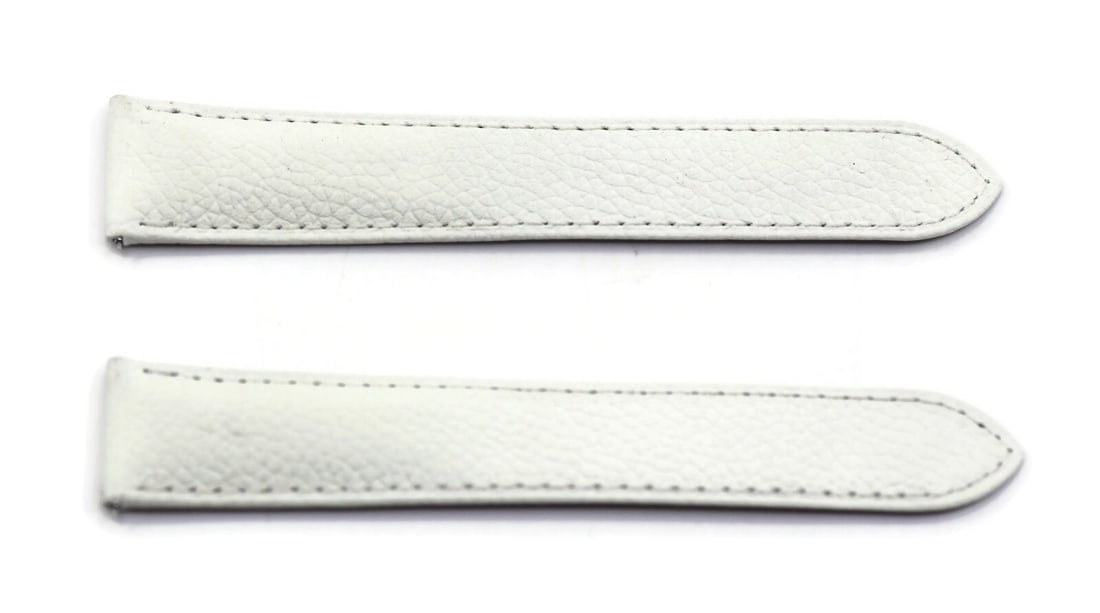 Cartier 21mm White Leather Wristwatch Strap 100% Authentic: Cartier 21mm White Leather Wristwatch Strap 100% Authentic Enhance your wristwatch with this exquisite Cartier White Leather Strap. Crafted from high-quality leather, this strap features a sleek white