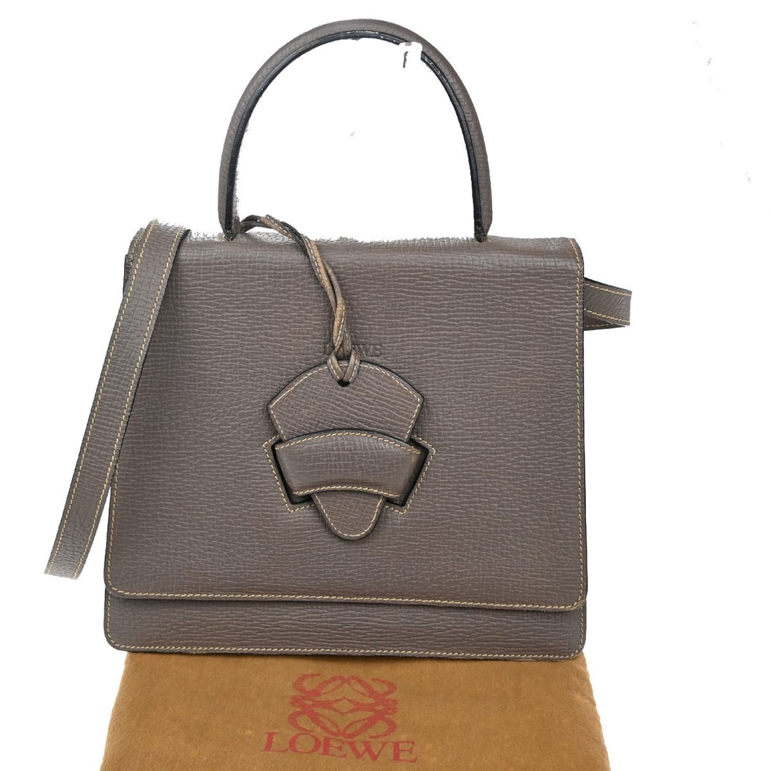 Purple Leather Barcelona Handbag by Loewe with Shoulder Strap: Purple Leather Barcelona Handbag by Loewe with Shoulder Strap This Loewe Barcelona shoulder bag is crafted from purple leather and designed for women. The bag features a 2-way shoulder style and is ma