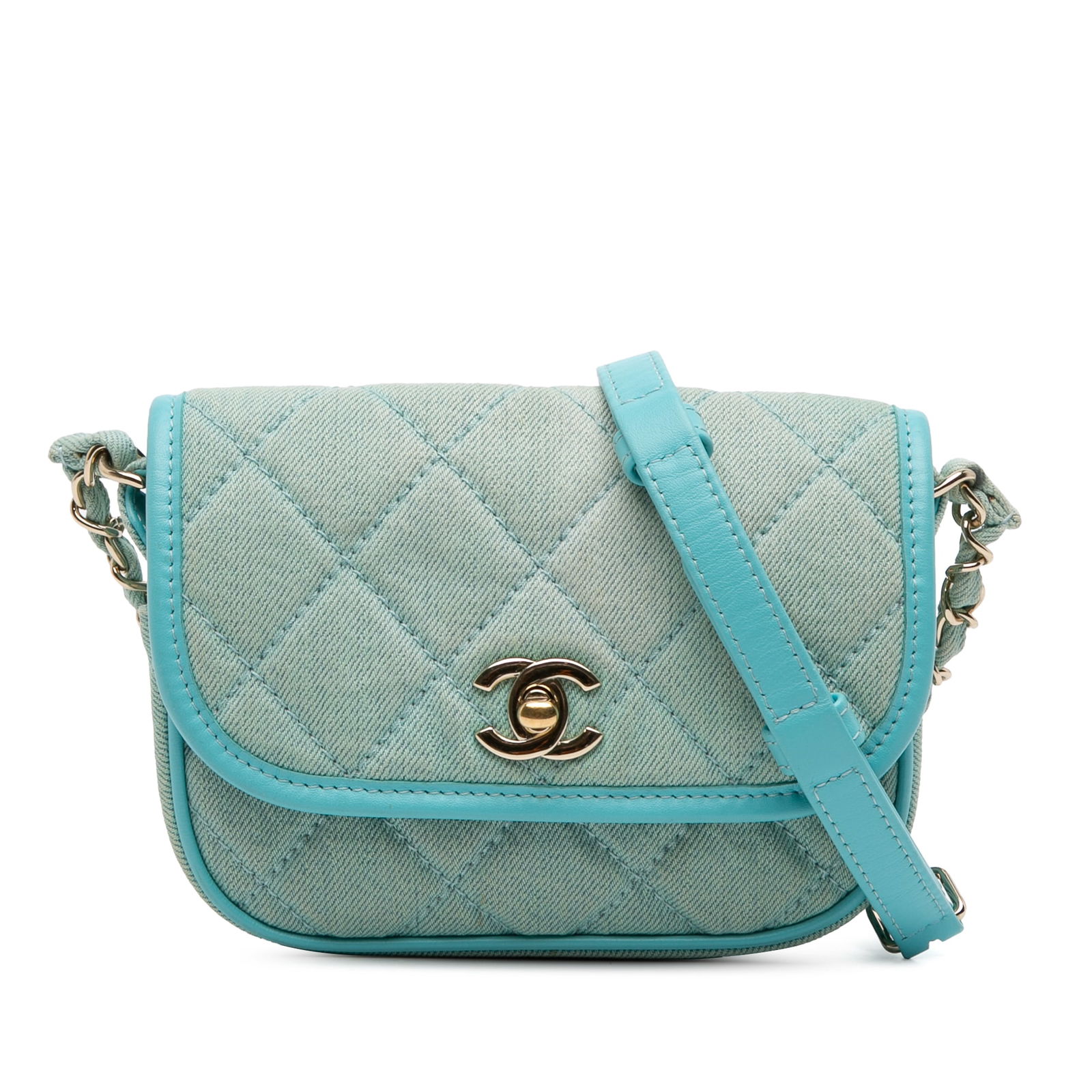 Chanel Mini CC Quilted Denim Messenger Flap Blue Crossbody Bag: Chanel Mini CC Quilted Denim Messenger Flap Blue Crossbody Bag This exquisite Chanel Mini CC Quilted Denim Messenger Flap is a stylish crossbody bag that combines a chic quilted denim body with luxuri