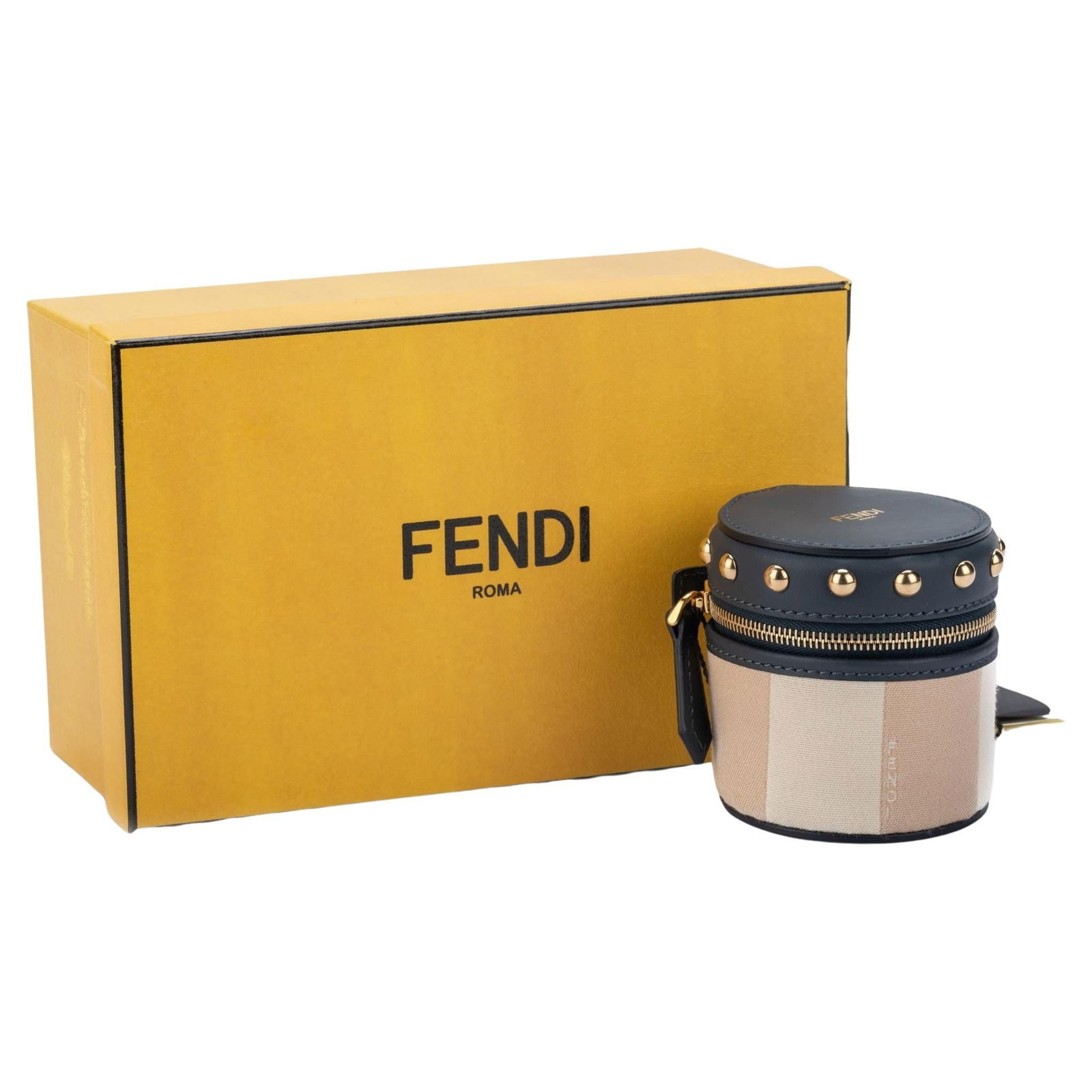 Fendi Pinstriped Travel Jewelry Case with Gold Hardware: Fendi Pinstriped Travel Jewelry Case with Gold Hardware This exquisite travel jewelry case by Fendi is designed for the modern traveler. Crafted from pinstriped fabric combined with black leather and