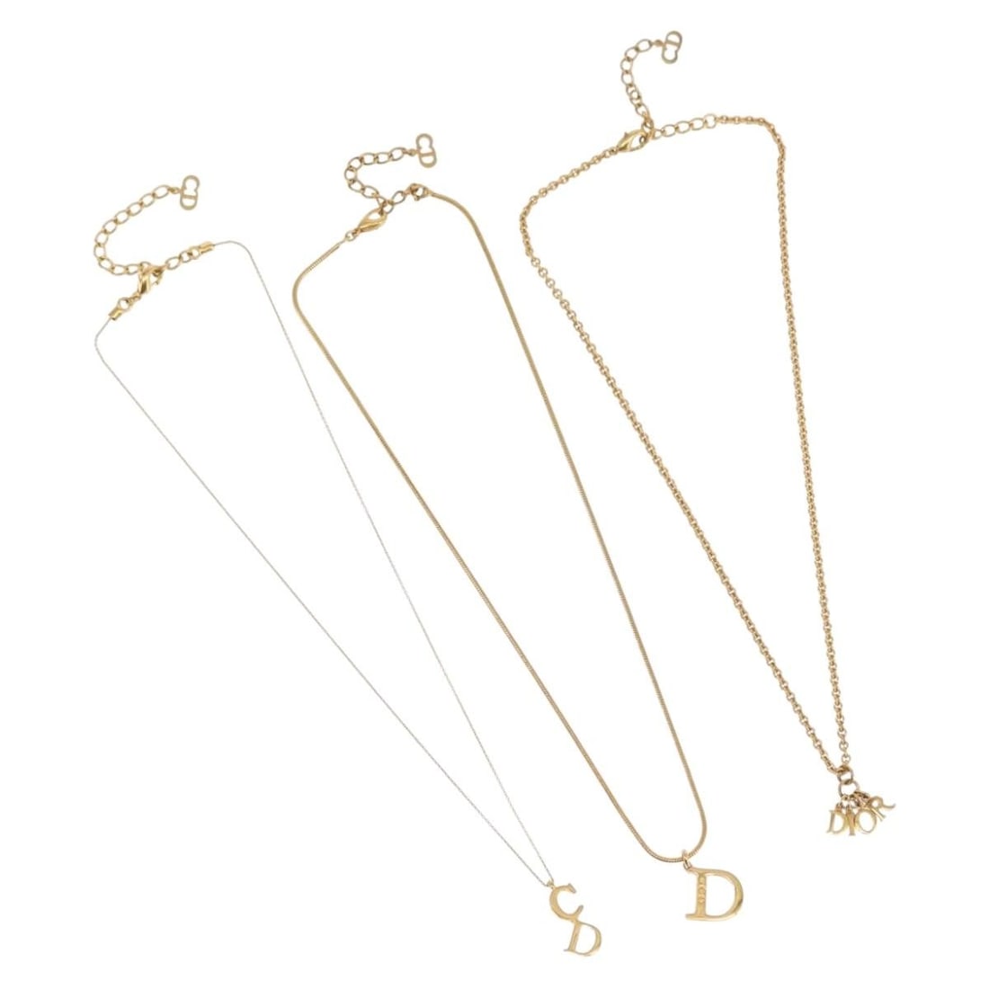 Christian Dior Gold Metal Necklace Trio With Box: Christian Dior Gold Metal Necklace Trio With Box This Christian Dior necklace set features three gold-tone metal necklaces, offered as a special bundle. The set comes with the original item box and is