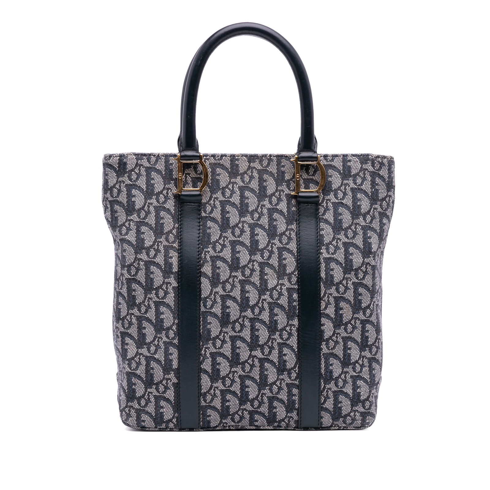 Dior Diorissimo Trotter Blue Canvas Tote Bag with Leather Trim: Dior Diorissimo Trotter Blue Canvas Tote Bag with Leather Trim The Diorissimo Trotter Canvas Tote is a stylish and functional accessory, crafted from durable canvas with luxurious leather trim. This t