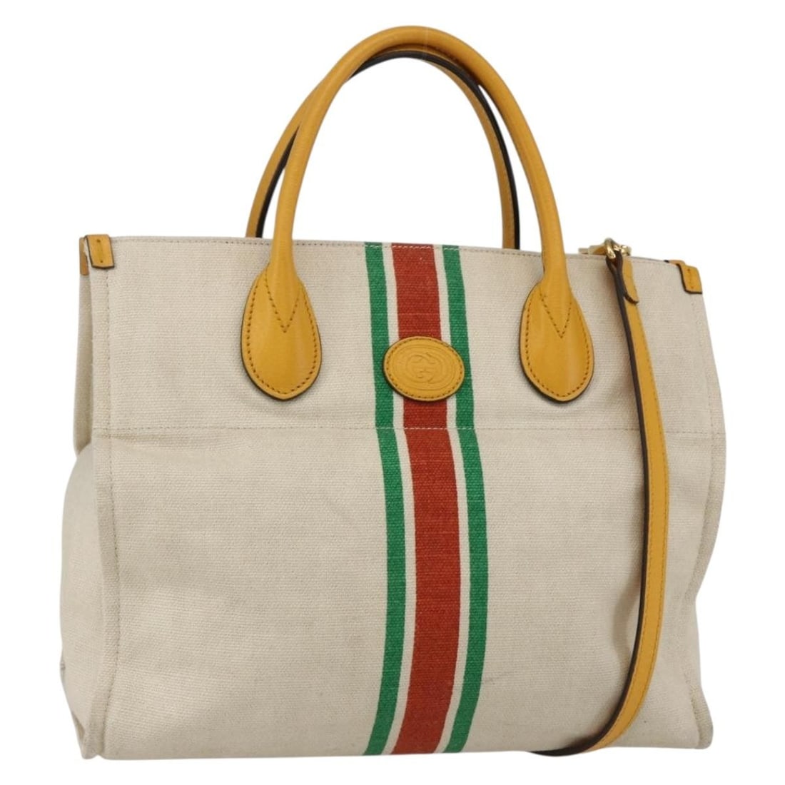 Beige Canvas Gucci Foldable Web Tote with Leather Trim: Beige Canvas Gucci Foldable Web Tote with Leather Trim This Gucci Foldable Web Tote is crafted from durable beige canvas with leather accents. Designed for women, the tote features a spacious interior