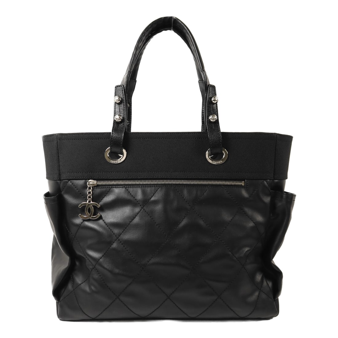 Chanel Biarritz Medium Black Coated Canvas Tote Bag Silver Hardware: Chanel Biarritz Medium Black Coated Canvas Tote Bag Silver Hardware This CHANEL Biarritz MM tote bag is crafted from black PVC coated canvas and features silver-tone hardware. The spacious design offe