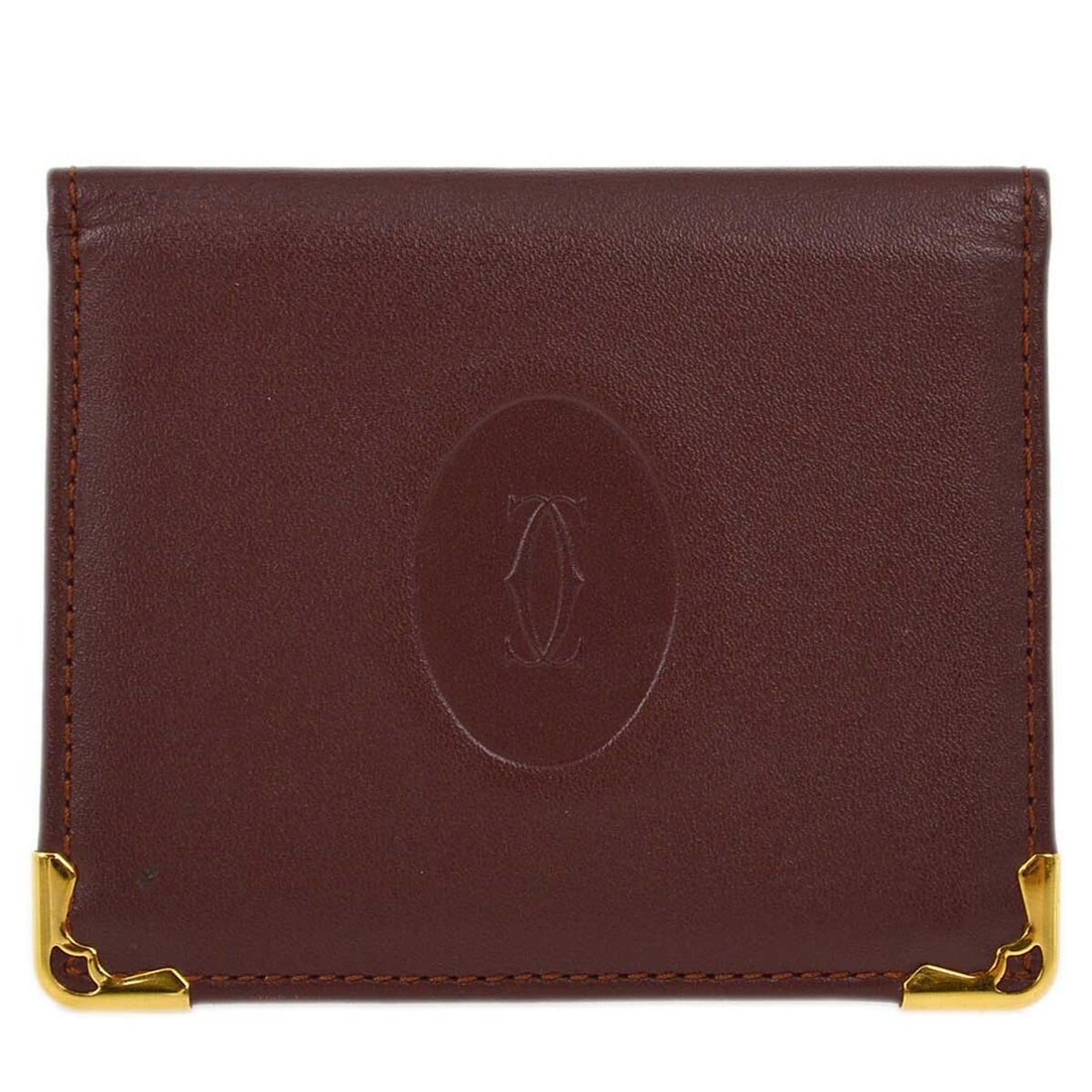 Cartier Vintage Bordeaux Leather Compact Mirror: Cartier Vintage Bordeaux Leather Compact Mirror This exquisite Cartier Compact Mirror is a luxurious accessory crafted in Mexico. It features a striking bordeaux red leather exterior and is designed i