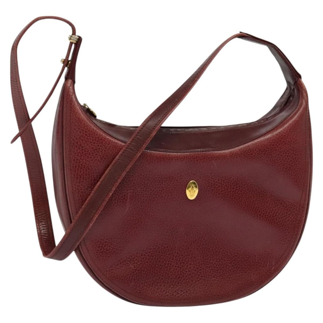 Cartier Must Line Bordeaux Leather Shoulder Bag Gold Hardware: Cartier Must Line Bordeaux Leather Shoulder Bag Gold Hardware This is an un-used Cartier Must Line shoulder bag crafted from leather in a Bordeaux color with gold-tone accents. Made in Italy, the bag