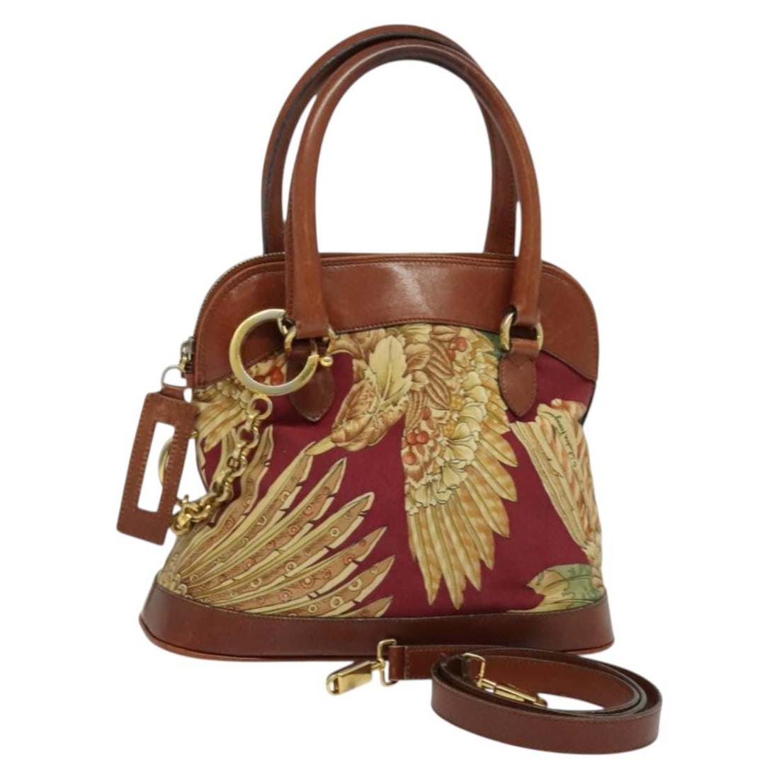 Salvatore Ferragamo Canvas Hand Bag Brown Gold Made in Italy: Salvatore Ferragamo Canvas Hand Bag Brown Gold Made in Italy This Salvatore Ferragamo Hand Bag combines luxurious style with practical functionality. Made from durable canvas, it features a sophistica