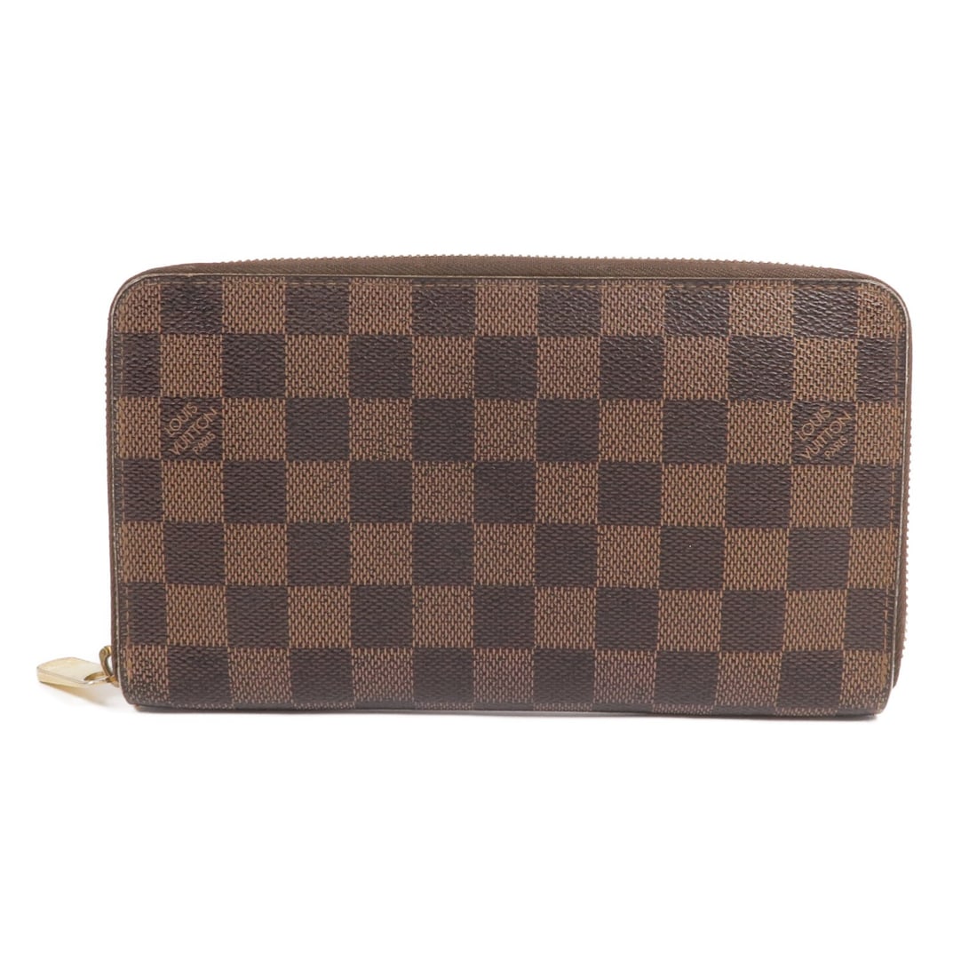 LOUIS VUITTON Damier Brown Zippy Organizer Long Wallet N60003: LOUIS VUITTON Damier Brown Zippy Organizer Long Wallet N60003 This Louis Vuitton Zippy Organizer Long Wallet is crafted from durable PVC coated canvas in a classic Damier Brown pattern. Designed for f