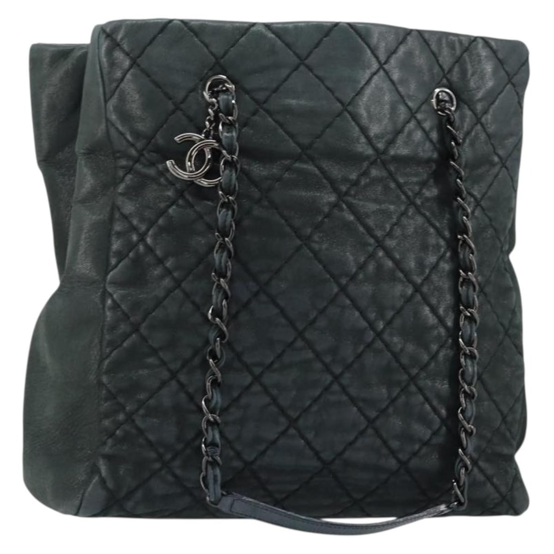 Green Quilted Calfskin Tote Bag by Chanel CC Charm: Green Quilted Calfskin Tote Bag by Chanel CC Charm This pre-owned Chanel CC Charm Tote features a quilted iridescent green calfskin leather exterior with a spacious interior. Designed for women, the t