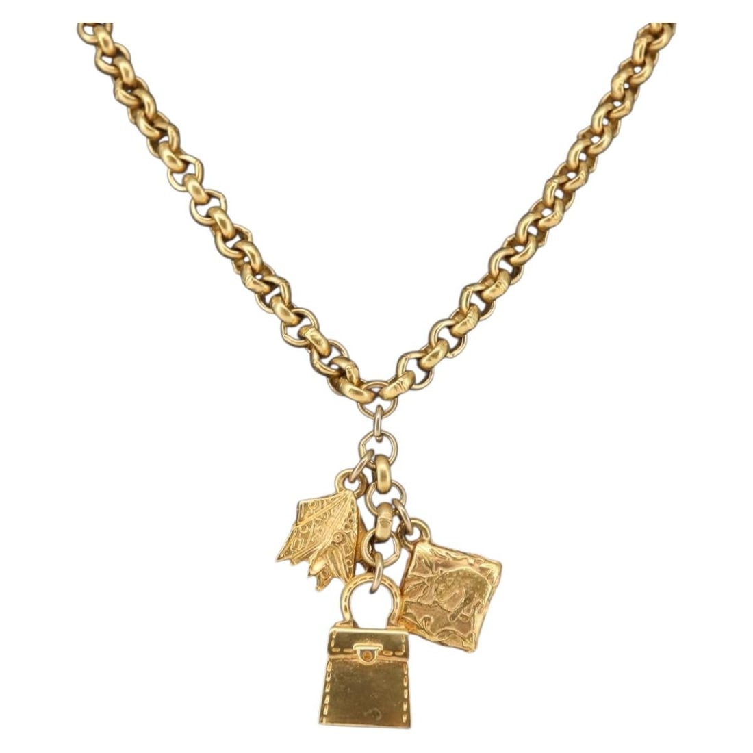 Gold Tone Metal Necklace by Salvatore Ferragamo Italy: Gold Tone Metal Necklace by Salvatore Ferragamo Italy This Salvatore Ferragamo necklace features a gold-tone metal construction and showcases a classic design. Made in Italy, the necklace measures app