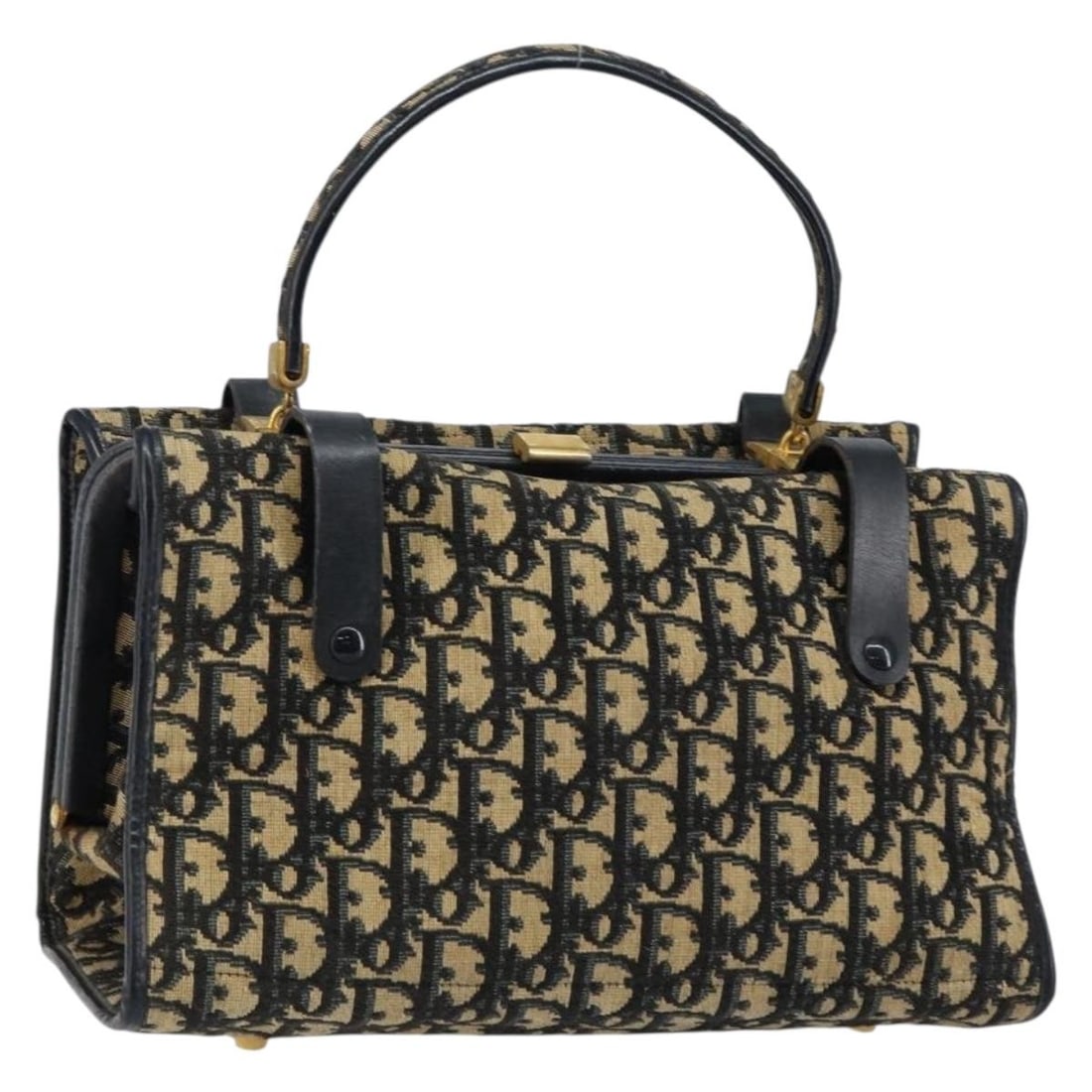 Vintage Dior Trotter Canvas Navy Handbag from France: Vintage Dior Trotter Canvas Navy Handbag from France This pre-owned Christian Dior Vintage Trotter handbag features a navy canvas exterior and is designed for women. The bag shows signs of use, includ