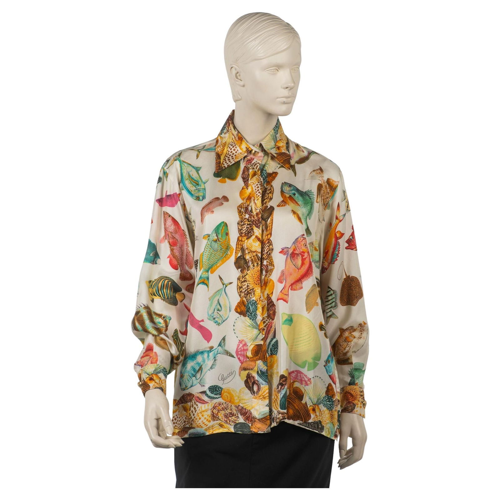 Gucci 1990s Silk Fish Print Button-Up Shirt Italy: Gucci 1990s Silk Fish Print Button-Up Shirt Italy This exquisite Gucci silk shirt from the 1990s showcases a vibrant fish pattern that captures the essence of vintage luxury. Crafted in Italy, it feat