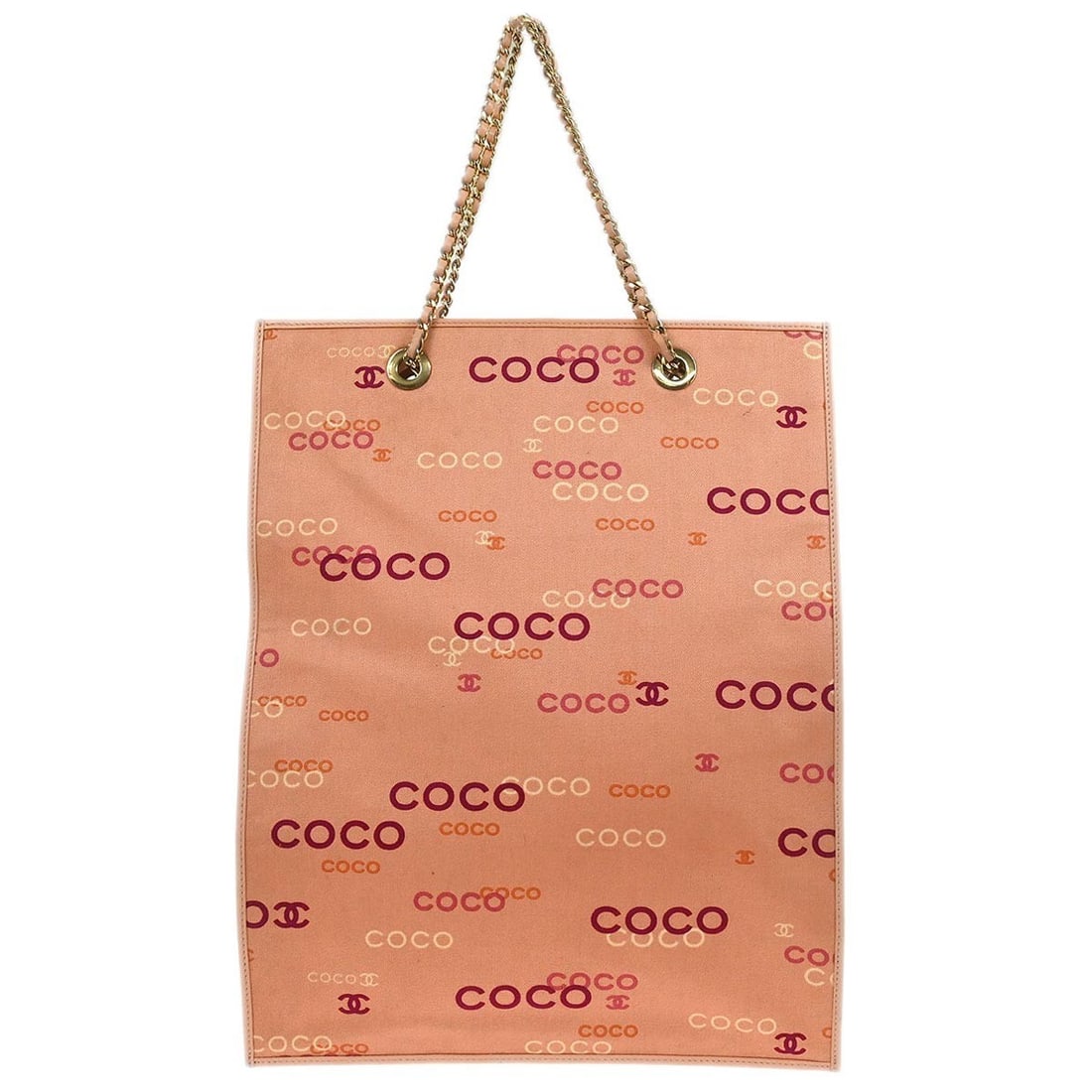 Chanel Medium Pink Canvas Tote Bag with Double Handles: Chanel Medium Pink Canvas Tote Bag with Double Handles This Chanel pink canvas COCO tote handbag features a spacious medium-sized design with double handles. The exterior is crafted from pink canvas,