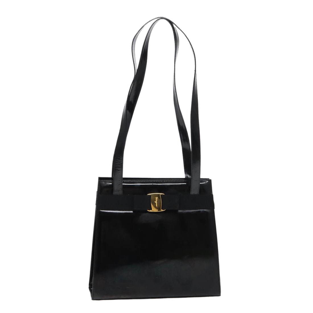 Black Patent Leather Shoulder Bag Vala by Salvatore Ferragamo: Black Patent Leather Shoulder Bag Vala by Salvatore Ferragamo This Salvatore Ferragamo Vala shoulder bag features black patent leather construction with a classic design. It shows signs of wear includ