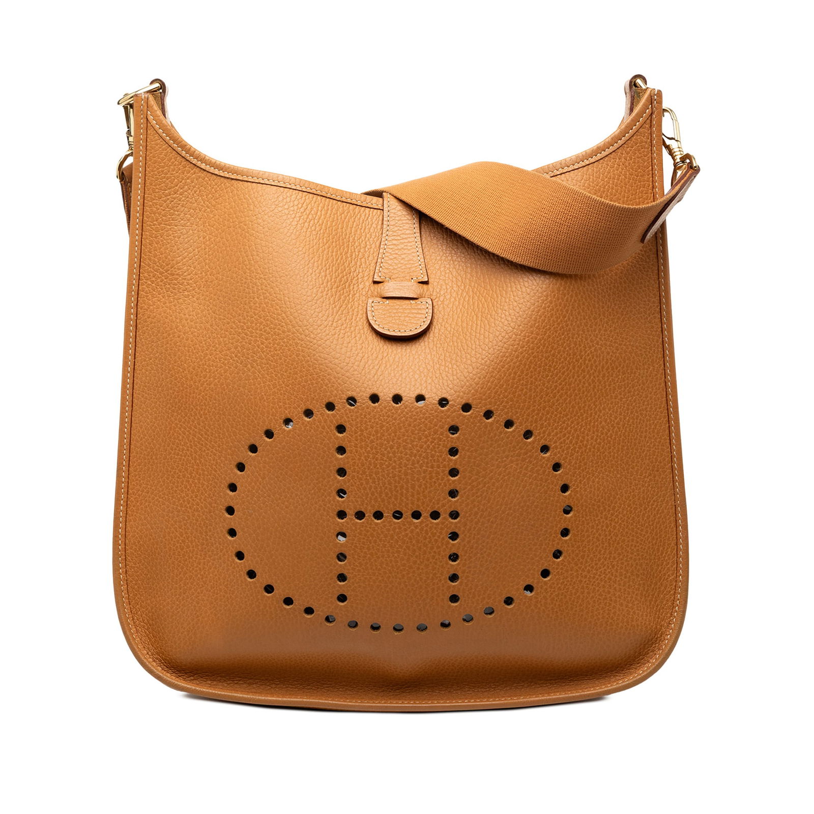 Ardennes Leather Evelyne GM Caramel Shoulder Bag by Hermes: Ardennes Leather Evelyne GM Caramel Shoulder Bag by Hermes The Hermes Ardennes Evelyne GM is crafted from Ardennes leather in a caramel brown color. It features a detachable flat canvas strap and an o