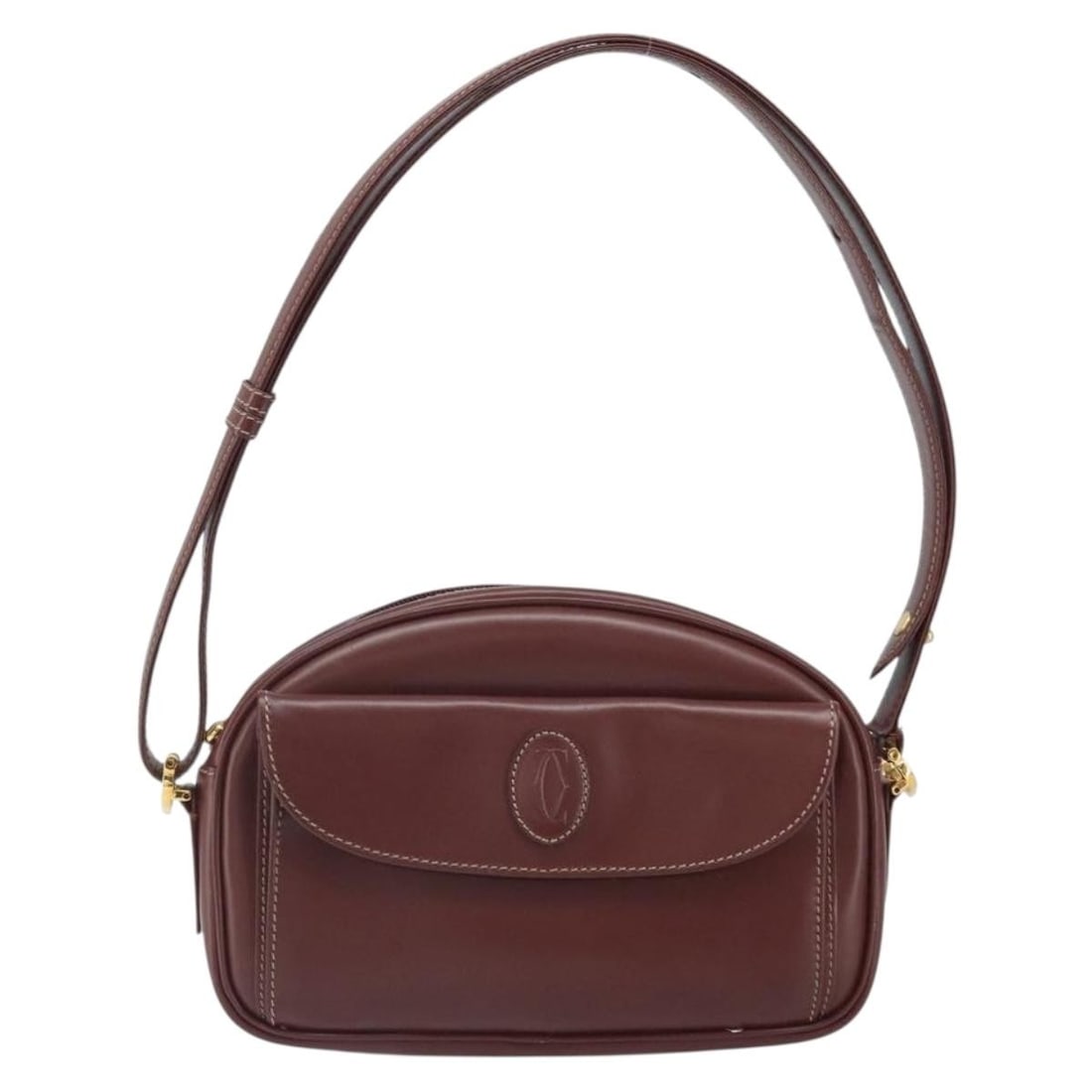 Leather Burgundy Shoulder Bag by Cartier Must de Cartier: Leather Burgundy Shoulder Bag by Cartier Must de Cartier This burgundy leather shoulder bag from Cartier's Must de Cartier collection is designed for women. The bag features a compact size suitable fo