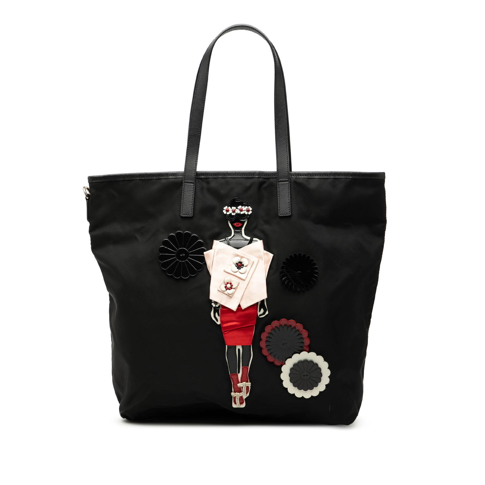 Prada Tessuto Tote with Saffiano Leather Trim and Applique: Prada Tessuto Tote with Saffiano Leather Trim and Applique This Prada Saffiano Trimmed Tessuto Applique Tote features a durable nylon body accented with saffiano leather trim, flat leather straps, and