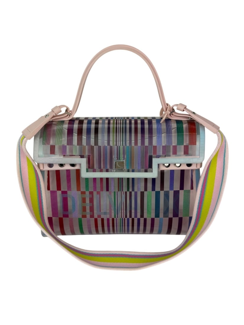 Delvaux Tempete The Eye Catcher Multicolor Satchel Bag: Delvaux Tempete The Eye Catcher Multicolor Satchel Bag Elevate your accessory collection with the Delvaux PVC Tempete The Eye Catcher Multicolor Satchel Bag. This stylish trapezoid-shaped bag features
