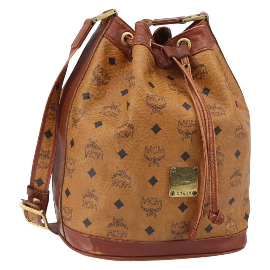 Brown PVC MCM Visetos Shoulder Purse 24x27x14cm: Brown PVC MCM Visetos Shoulder Purse 24x27x14cm This MCM Visetos shoulder bag for women features a brown PVC exterior with visible signs of wear including surface deformation, rubbing, stains, scratch