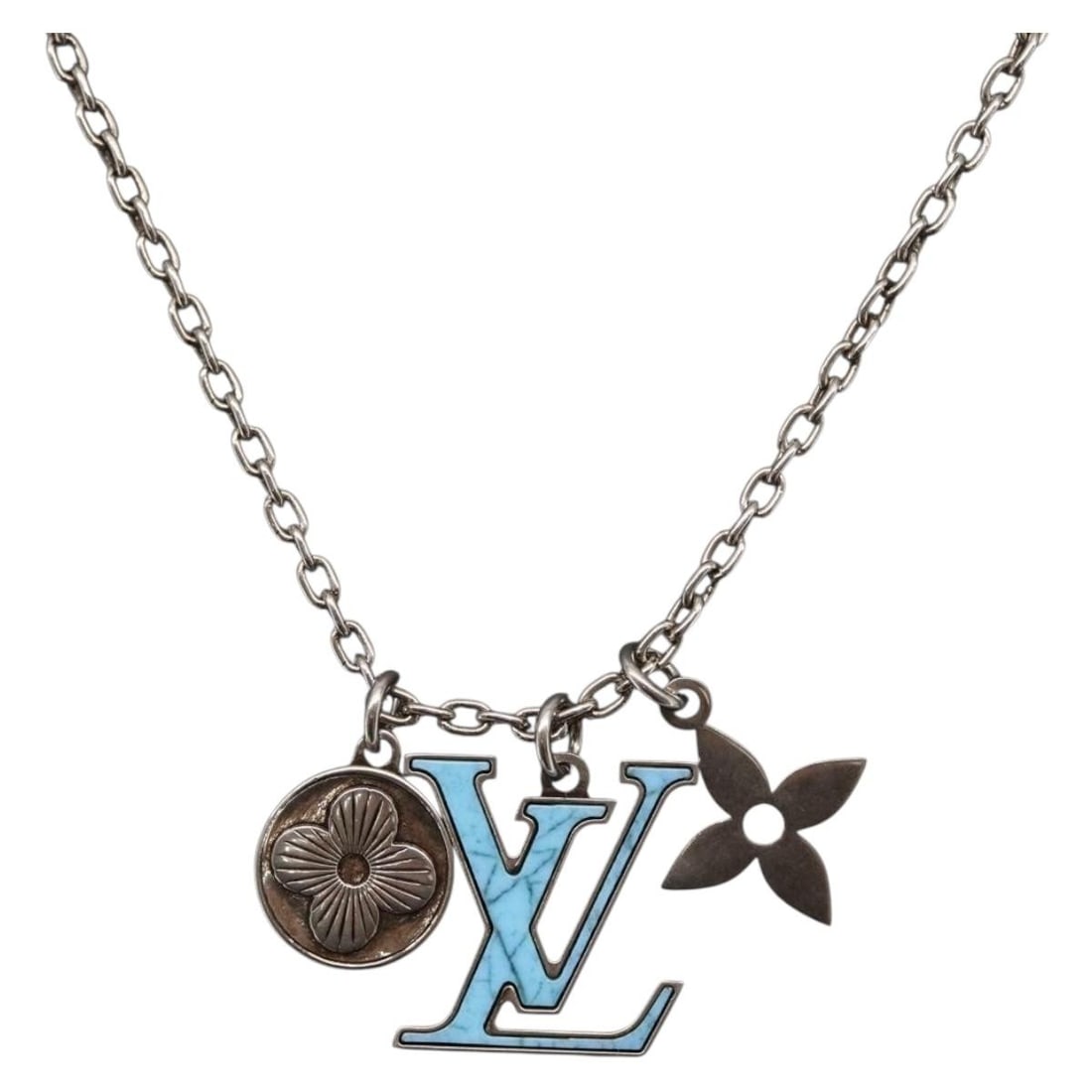 Turquoise Louis Vuitton M68904 Printed Initials Necklace with Box: Turquoise Louis Vuitton M68904 Printed Initials Necklace with Box This Louis Vuitton LV Printed Initials Turquoise Necklace features a silver tone metal design. The necklace is crafted in Italy and co