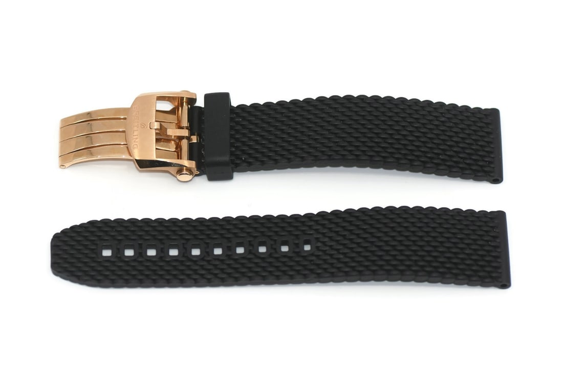 Authentic Breitling 18K Rose Gold Deployment Buckle Strap 22mm: Authentic Breitling 18K Rose Gold Deployment Buckle Strap 22mm Elevate your timepiece with this stunning Breitling 18K Rose Gold Deployment Buckle Strap. Designed for luxury and style, this two-piece