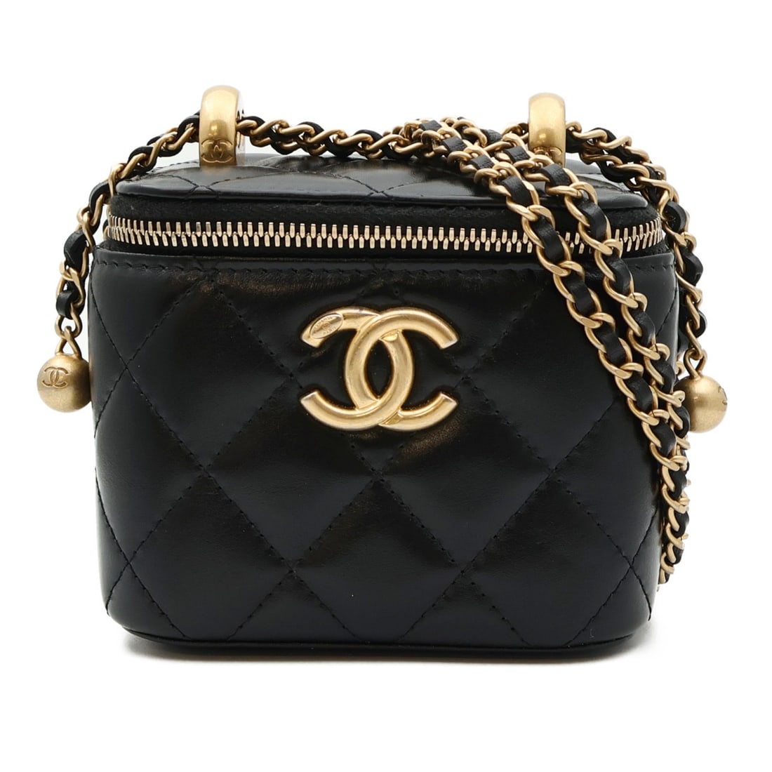 Black Lambskin Mini Vanity Shoulder Bag by CHANEL with Gold Tone CC Chain: Black Lambskin Mini Vanity Shoulder Bag by CHANEL with Gold Tone CC Chain This CHANEL Mini Vanity Case Chain Shoulder Bag features luxurious black lambskin leather and a compact design. The bag is cra