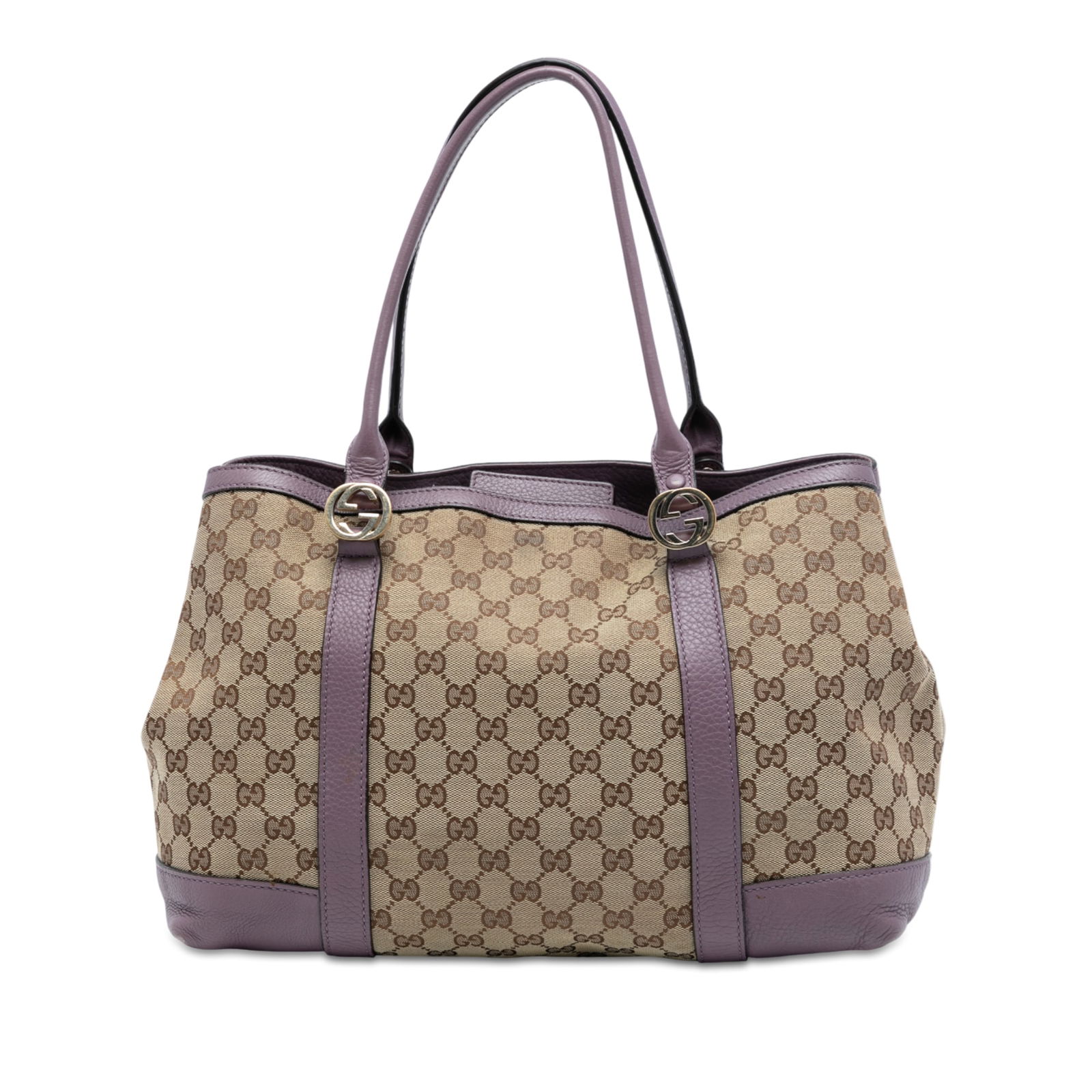 Brown Fabric Tote Gucci Miss GG with Leather Handles: Brown Fabric Tote Gucci Miss GG with Leather Handles The Gucci GG Canvas Miss GG Tote features a brown canvas body with leather trim and rolled leather handles. It has an open top secured with a magne