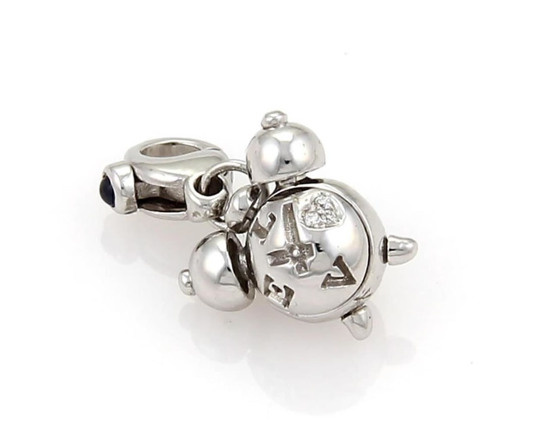 18k White Gold Diamond Clock Charm Pendant by Pasquale Bruni: 18k White Gold Diamond Clock Charm Pendant by Pasquale Bruni This original Pasquale Bruni charm pendant features a distinctive diamond clock motif crafted in 18k white gold. The pendant is signed by P