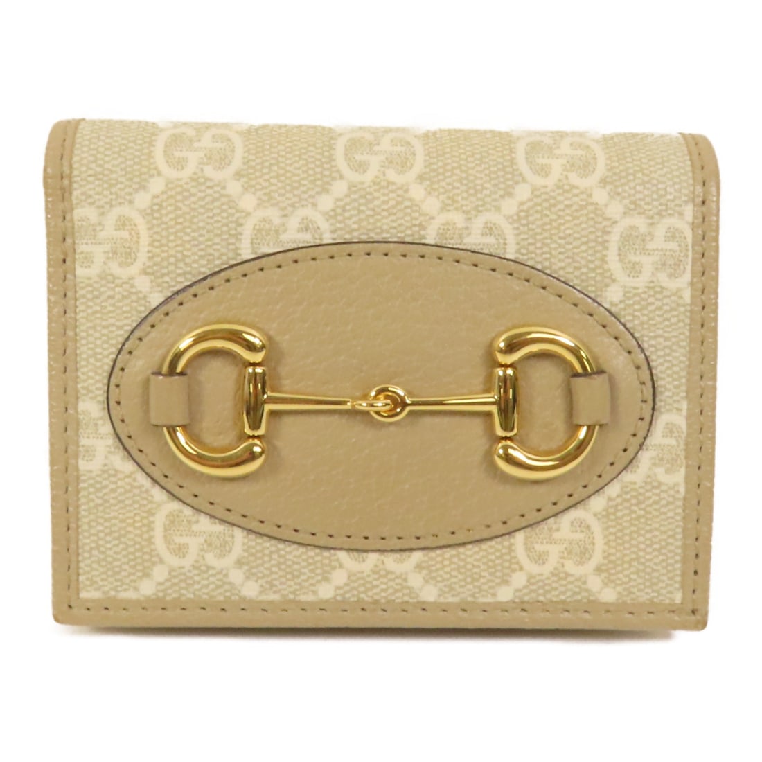 Gucci Horsebit 1955 Beige Canvas Bi-Fold Wallet with Gold Hardware: Gucci Horsebit 1955 Beige Canvas Bi-Fold Wallet with Gold Hardware This Gucci Horsebit 1955 bi-fold wallet features a beige PVC coated canvas exterior and gold tone hardware. Crafted in Italy, it offe