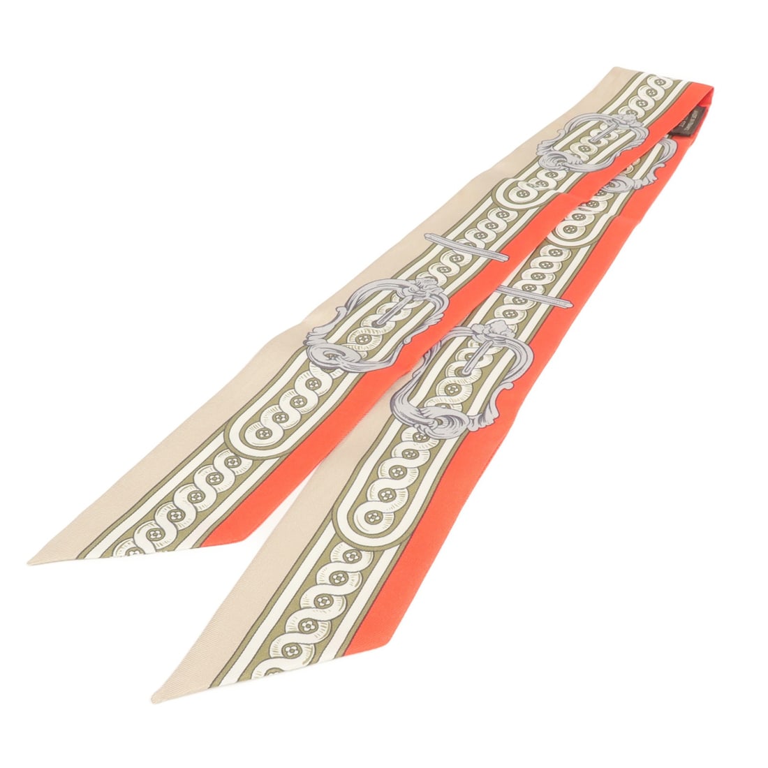 Red and Gray Silk Twilly Scarf by Hermes: Red and Gray Silk Twilly Scarf by Hermes This Hermes Twilly scarf is crafted from silk and features a red and gray color palette. Made in France, it offers a stylish and versatile accessory option. Th