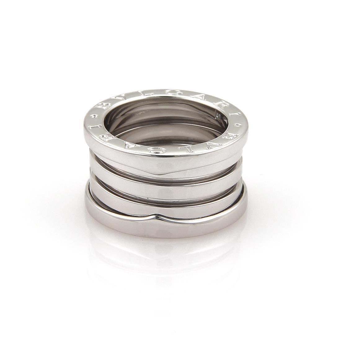 Bvlgari B Zero-1 18k White Gold Flex Band Ring US 5: Bvlgari B Zero-1 18k White Gold Flex Band Ring US 5 This authentic Bulgari B Zero-1 band ring, expertly crafted from 18k white gold, is a stunning addition to any jewelry collection. The design featur