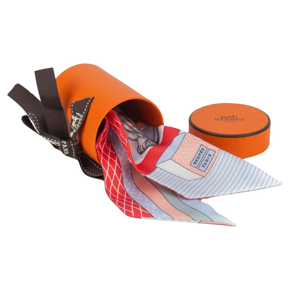 Hermes Grand Theatre Nouveau Silk Twilly 2 x 34 inches France: Hermes Grand Theatre Nouveau Silk Twilly 2 x 34 inches France Introducing the Hermes Grand Theatre Nouveau Twilly, a luxurious silk accessory from the renowned brand Hermes. This versatile piece measu