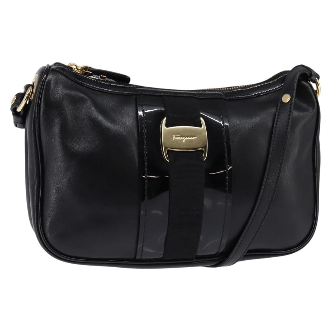 Black Leather Shoulder Bag Vala by Salvatore Ferragamo: Black Leather Shoulder Bag Vala by Salvatore Ferragamo This Salvatore Ferragamo Vala shoulder bag for women is crafted from black leather and features a compact design. It shows visible signs of use i