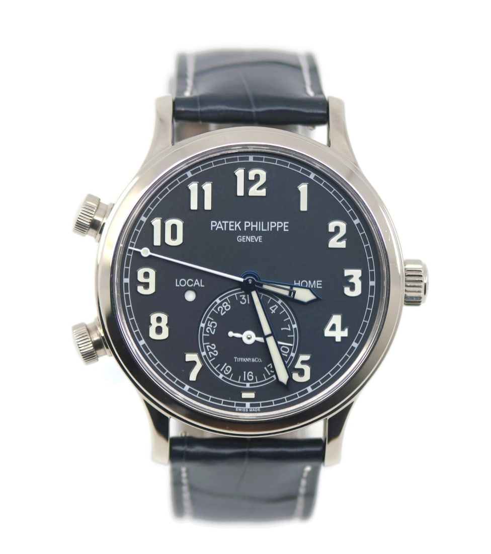 Patek Philippe Pilot Travel Time 18K White Gold Watch 5524G-001 Tiffany & Co: Patek Philippe Pilot Travel Time 18K White Gold Watch 5524G-001 Tiffany & Co Discover the elegance of the Patek Philippe Pilot Travel Time wristwatch, crafted in luxurious 18K white gold. This stunnin