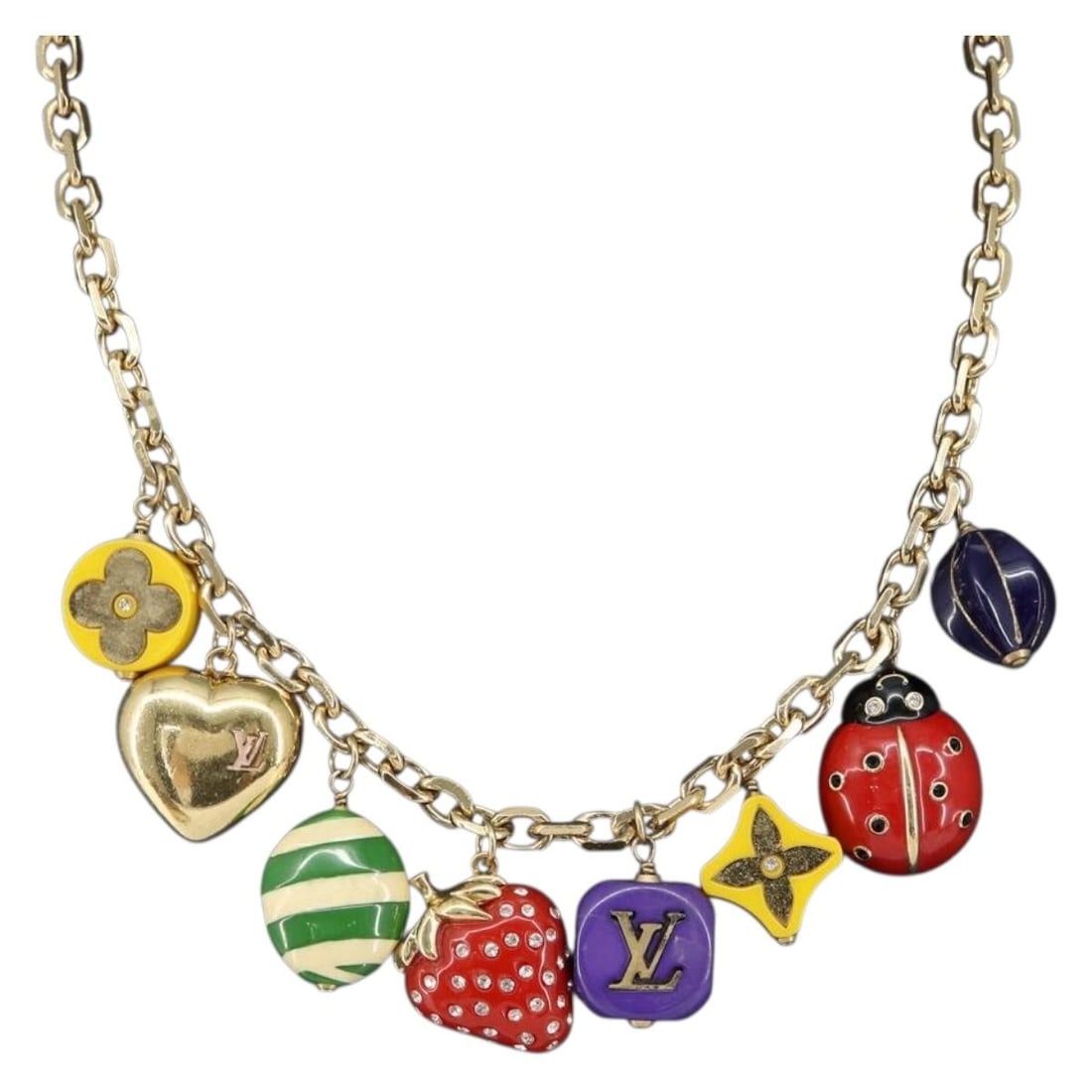 LOUIS VUITTON Collier Phrase Necklace Gold M64921 with Dust Bag: LOUIS VUITTON Collier Phrase Necklace Gold M64921 with Dust Bag This exquisite Louis Vuitton Collier Phrase Necklace is a stunning addition to any jewelry collection. Crafted in France, this piece fea