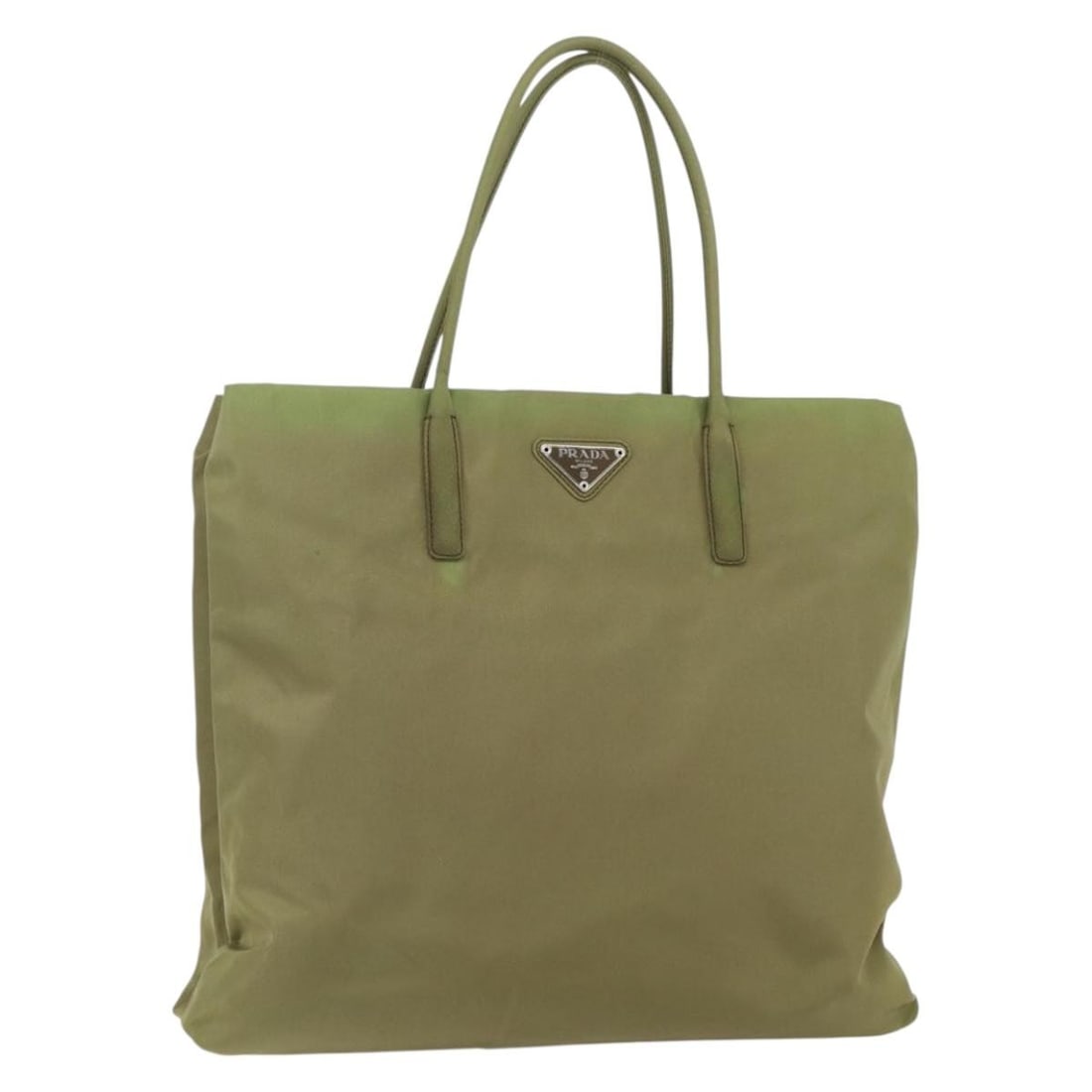 Green Tessuto Nylon Tote Bag by Prada Italy: Green Tessuto Nylon Tote Bag by Prada Italy This Prada Vintage Tote is crafted from green nylon and designed for women. It features a spacious interior and a classic silhouette. As a pre-owned item,