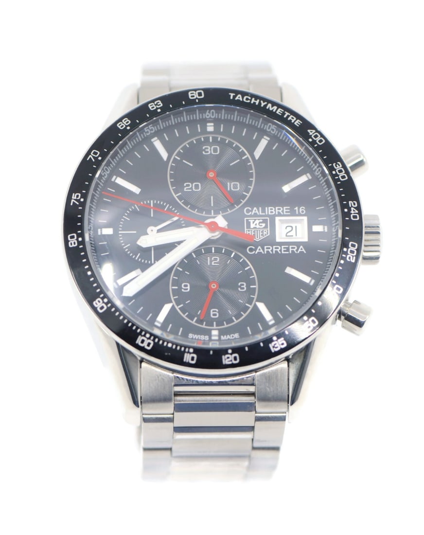 TAG Heuer Carrera Cal 16 Chronograph Stainless Steel Watch CV201AK with Box and Papers: TAG Heuer Carrera Cal 16 Chronograph Stainless Steel Watch CV201AK with Box and Papers Experience the elegance of the TAG Heuer Carrera Cal 16 Chronograph wristwatch. This sophisticated timepiece feat