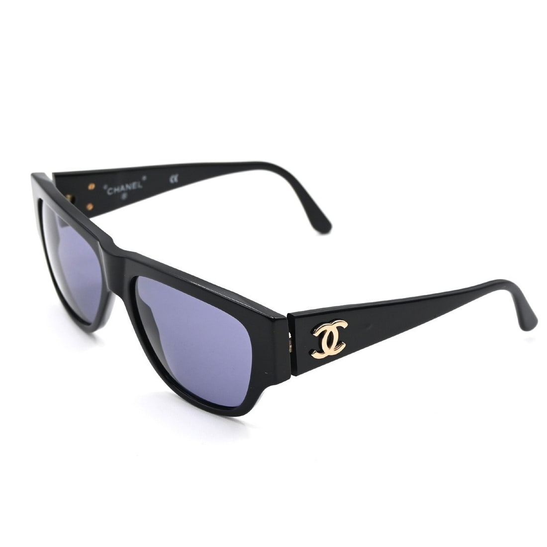 Chanel Black Plastic CC Logo Sunglasses for Women: Chanel Black Plastic CC Logo Sunglasses for Women These Chanel Logo CC sunglasses designed for women feature a black plastic frame. The lenses measure 5.5 cm in width and 4.5 cm in height. Made in Ita