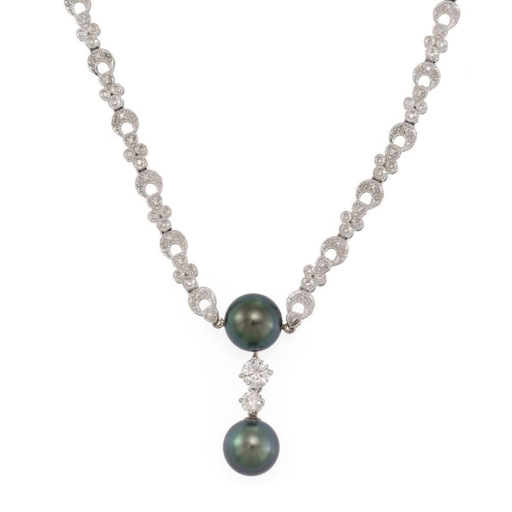 Elegant 14k White Gold Diamond Tahitian Pearl Necklace 3ct: Elegant 14k White Gold Diamond Tahitian Pearl Necklace 3ct This stunning necklace features a captivating design with two large dark gray-green Tahitian pearls and sparkling round cut diamonds. Crafted