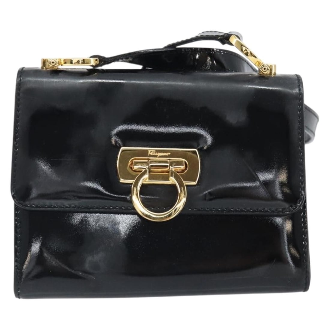 Salvatore Ferragamo Gancini Black Patent Leather Shoulder Bag: Salvatore Ferragamo Gancini Black Patent Leather Shoulder Bag This Salvatore Ferragamo Gancini shoulder bag is crafted from black patent leather and designed for women. It features a compact size suit