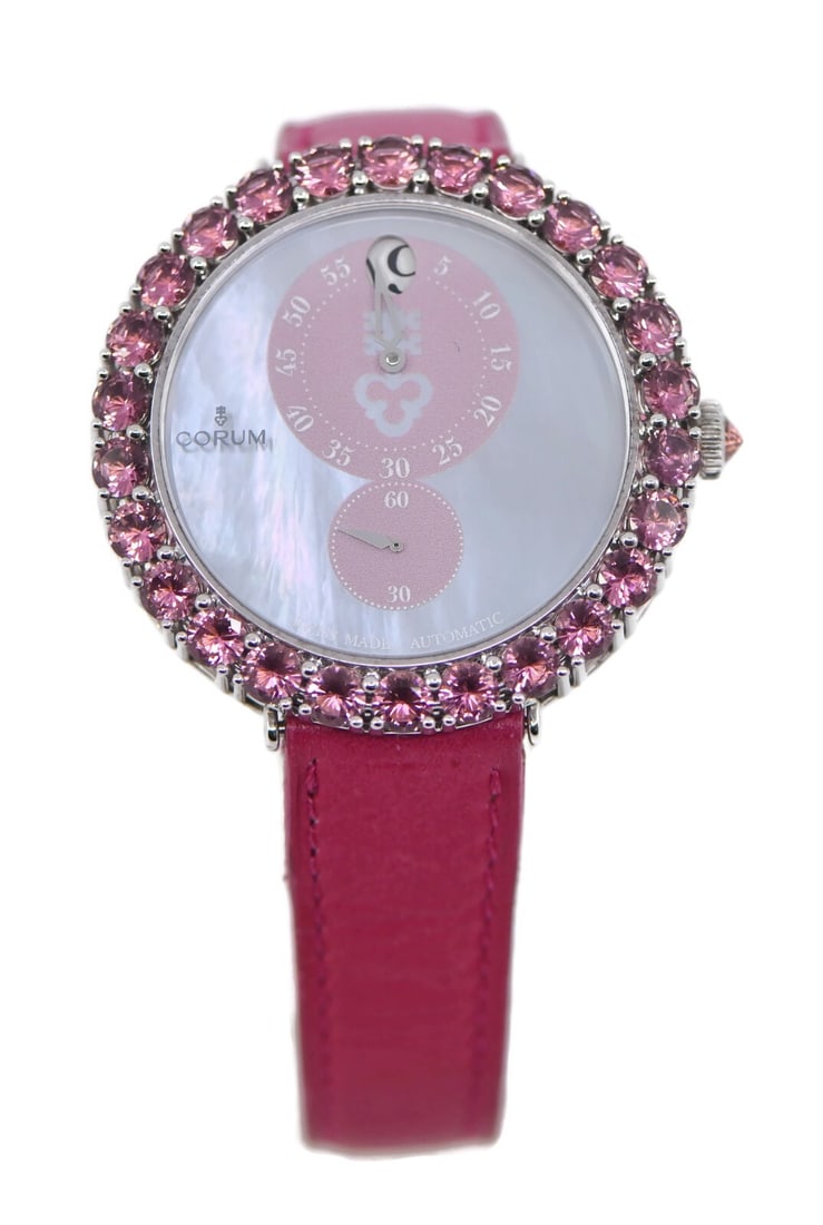 Corum Heritage Eleganza Tourmalines Sterling Silver Watch Z254/03643 with Box and Papers: Corum Heritage Eleganza Tourmalines Sterling Silver Watch Z254/03643 with Box and Papers Introducing the Corum Heritage Eleganza Tourmalines Sterling Silver Watch, a stunning timepiece that combines e