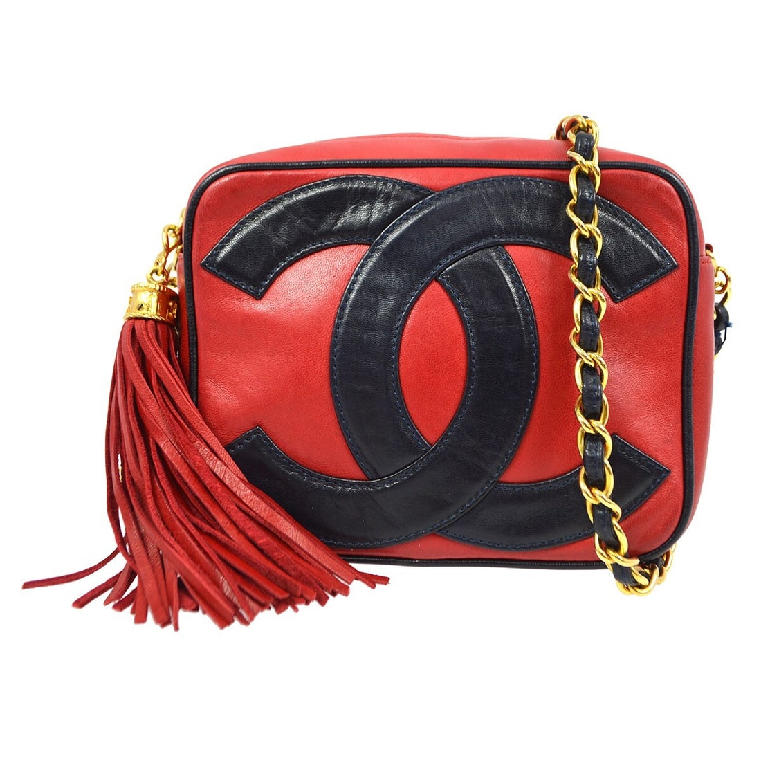 Chanel Cherry Red Lambskin Mini Camera Bag with Fringe: Chanel Cherry Red Lambskin Mini Camera Bag with Fringe Discover the elegance of this Chanel Red bi-color Lambskin Camera Bag Mini, designed for style and functionality. Crafted from luxurious lambskin