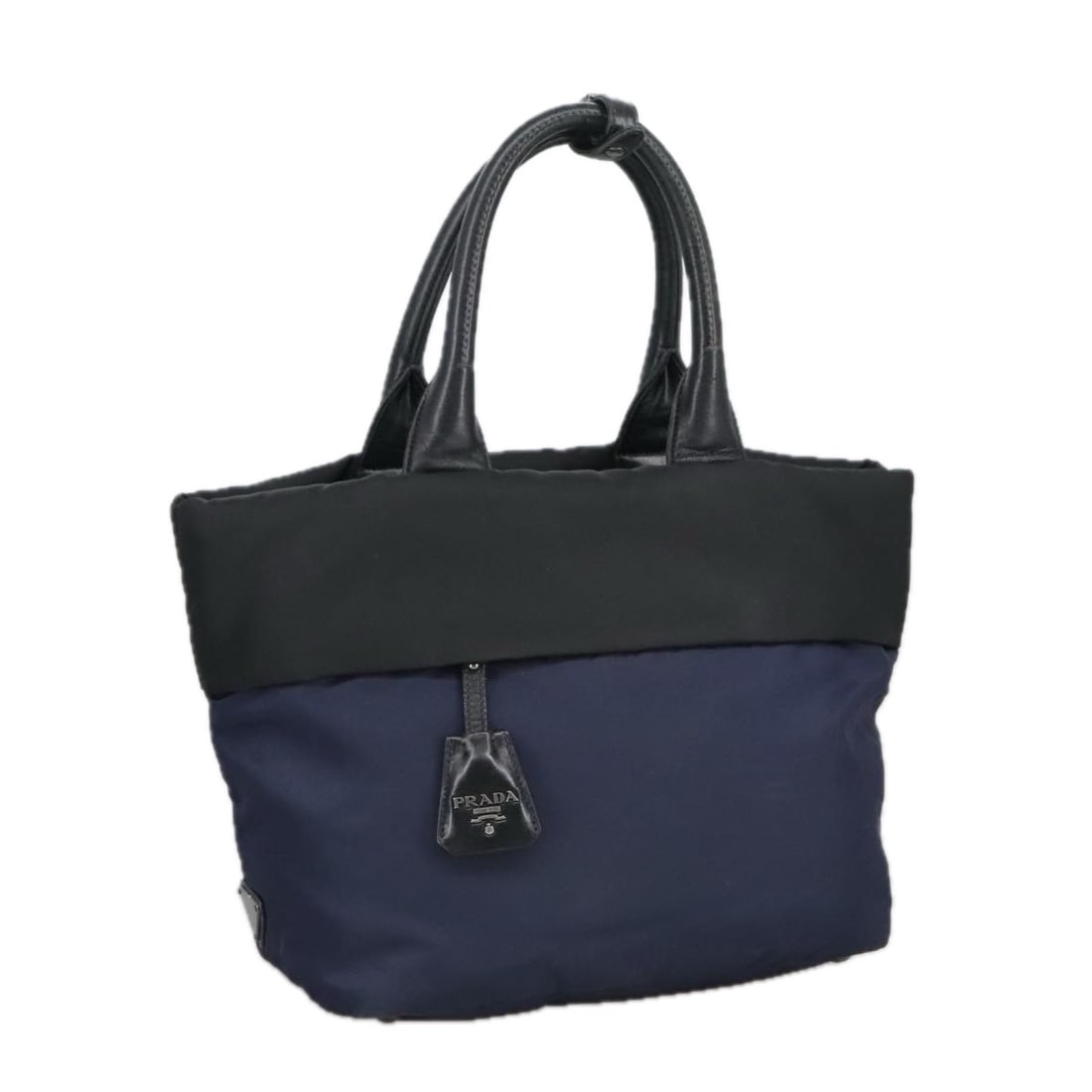 Navy Nylon Convertible Double Tote Bag by Prada 27cm x 22cm x 14cm: Navy Nylon Convertible Double Tote Bag by Prada 27cm x 22cm x 14cm This Prada Convertible Double Tote is crafted from navy nylon and designed for women. Made in Italy, it features both double handles